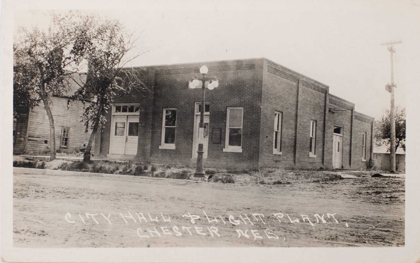 Chester Nebraska City Hall and Light Plant Postcard 1922 main image